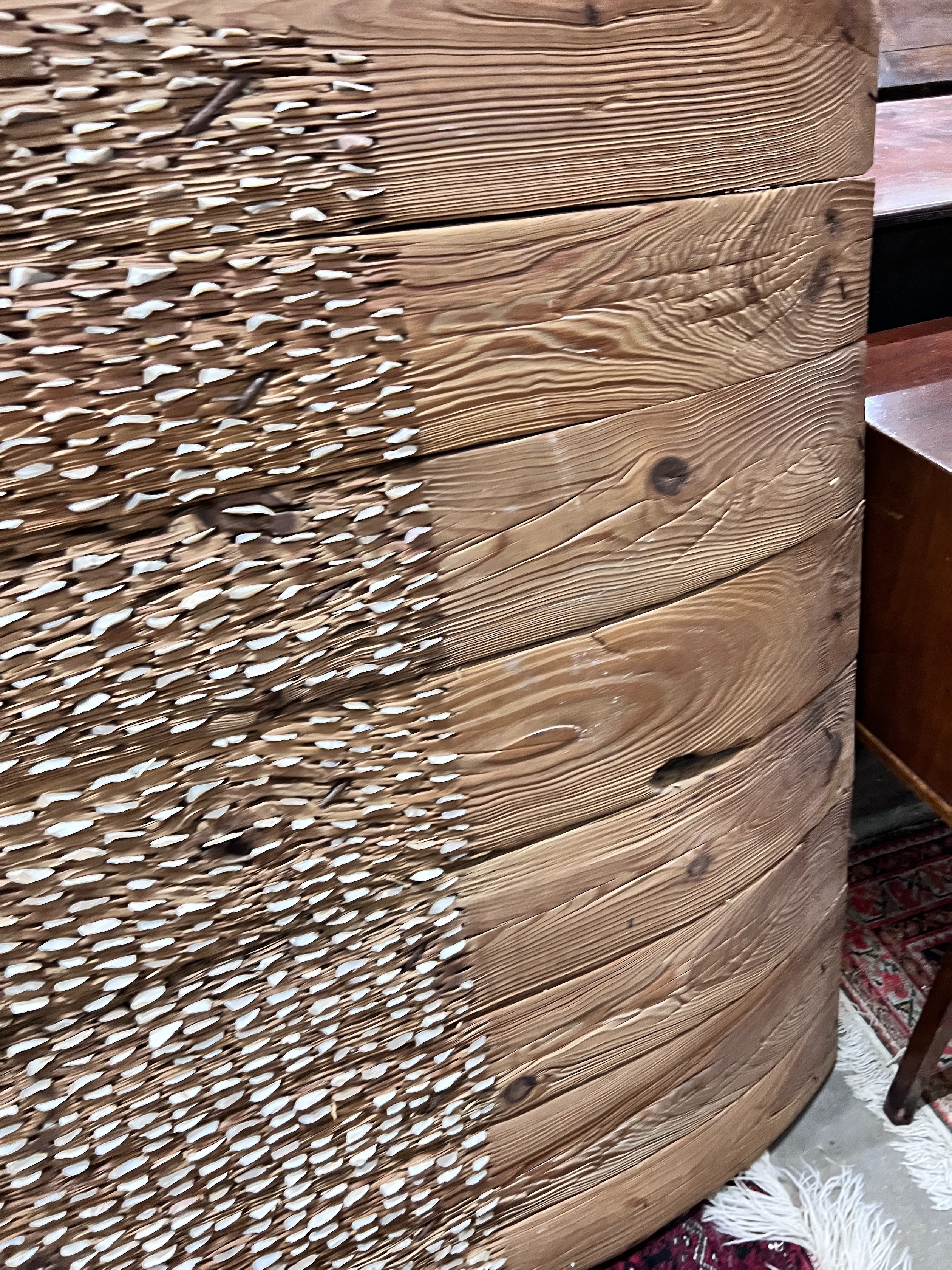 A vintage shell and planked pine threshing board, length 198cm, depth 121cm *Please note the sale commences at 9am.
